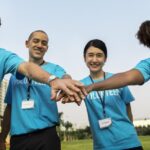 multiethnicity-volunteers-with-hands-their-stacked-together-in-a-huddle